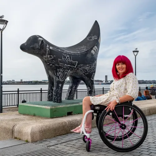 Person using the Custom wheelchairs DaVinci Mobility Legerra custom wheelchair, demonstrating its comfort, maneuverability, and lightweight design.